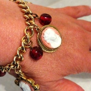 Beautiful double sided camera and beads charm bracelet.